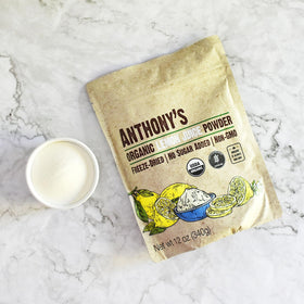 Powder dissolving in water to create refreshing lemonade with no added sugar.