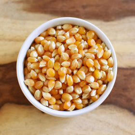 Anthony's Organic kernels in an air popper producing light, fluffy popcorn.