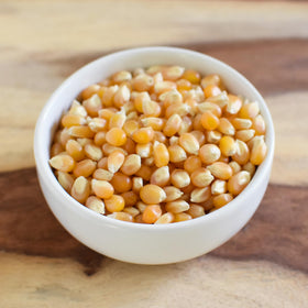 A bowl of freshly popped Anthony's popcorn, golden and crisp.