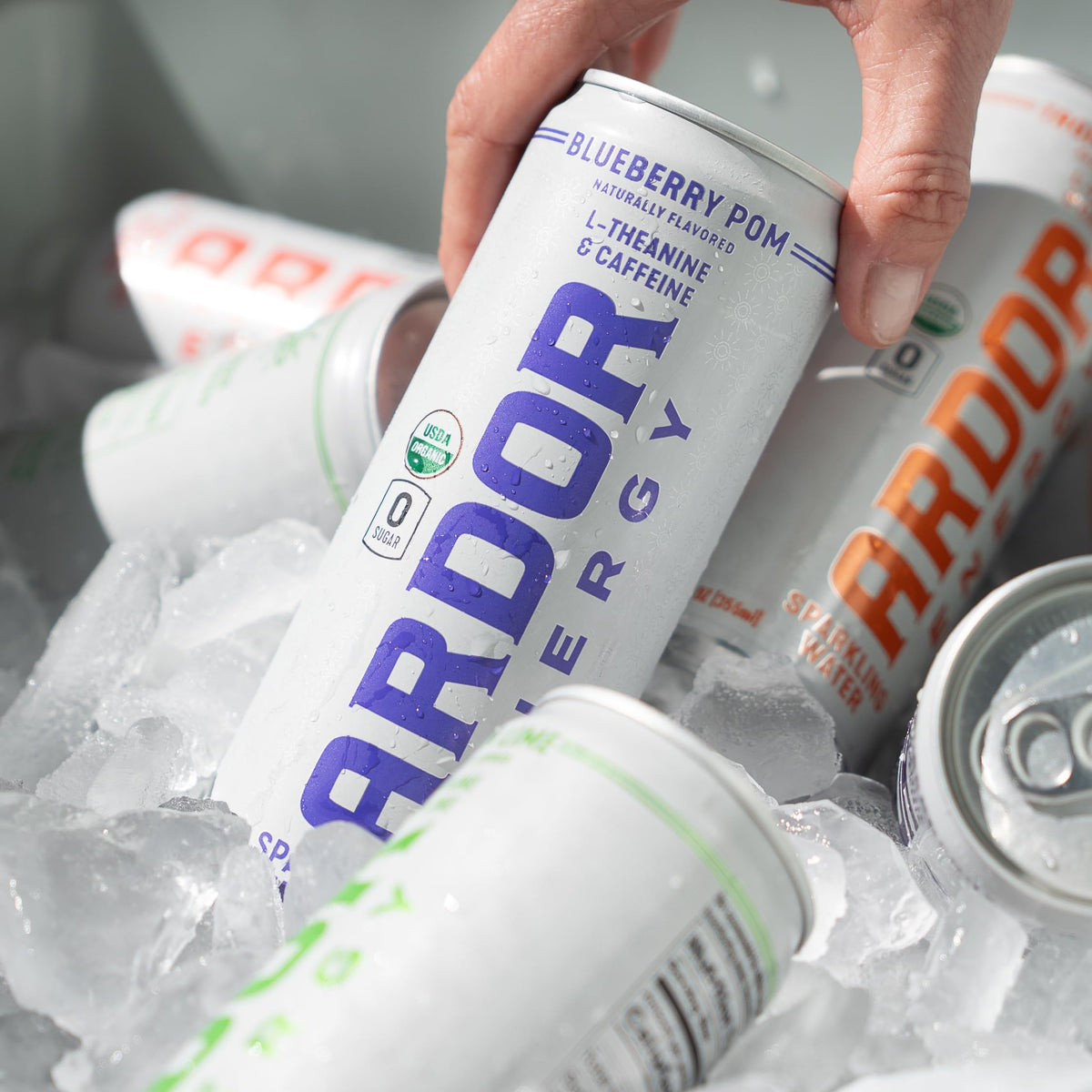ARDOR Energy can close-up with visible fizz and light fruit flavor.