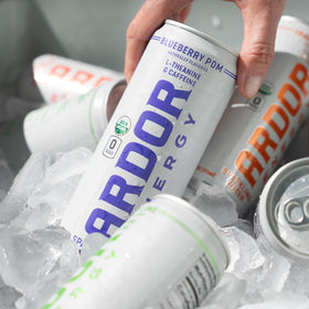 ARDOR Energy can close-up with visible fizz and light fruit flavor.