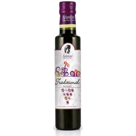 Ariston The Very Best balsamic being poured for a glaze