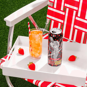 Arizona Arnold Palmer Strawberry Half & Half 22 oz big can on display.
