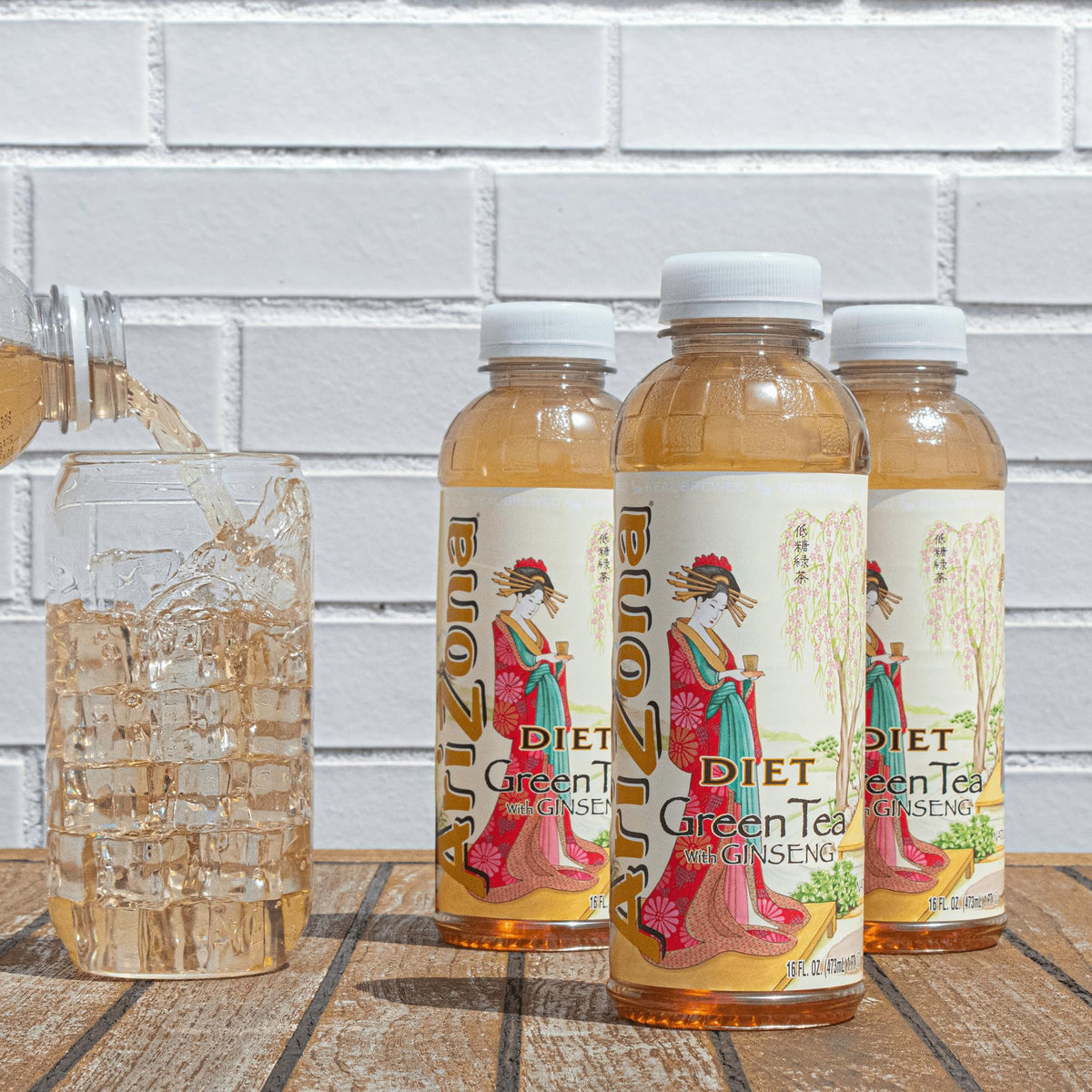 AriZona Diet Green Tea 12-pack served in glass showcases refreshing aroma and color.