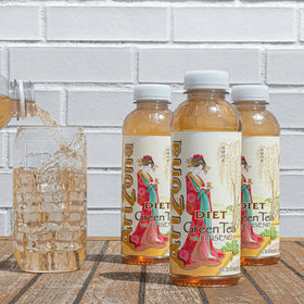 AriZona Diet Green Tea 12-pack served in glass showcases refreshing aroma and color.