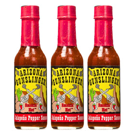 Arizona Gunslinger Smokin' Red Jalapeño Sauce bottle closeup for bold flavor inspiration.