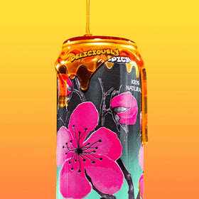AriZona Spicy Green Tea can and glass, showcasing fiery honey finish and bright flavor