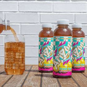 Arizona Tea bottles in refrigerator display, ready for family gatherings and on-the-go.