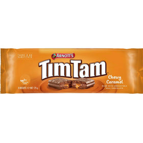 Arnott’s Tim Tam caramel center close-up showing gooey interior and chocolate shell.