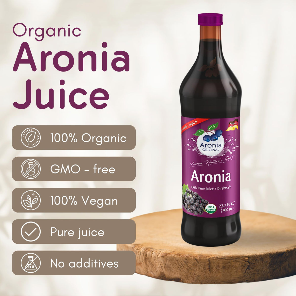 Aronia Original juice bottle pour demonstrates convenient daily serving.