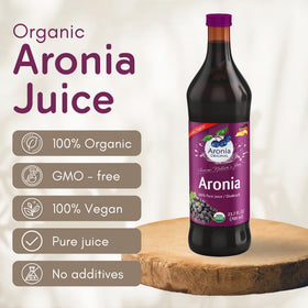 Aronia Original juice bottle pour demonstrates convenient daily serving.
