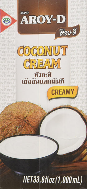 Aroy-D Pure Coconut Cream cartons on shelf, ideal dairy-free cooking and baking.