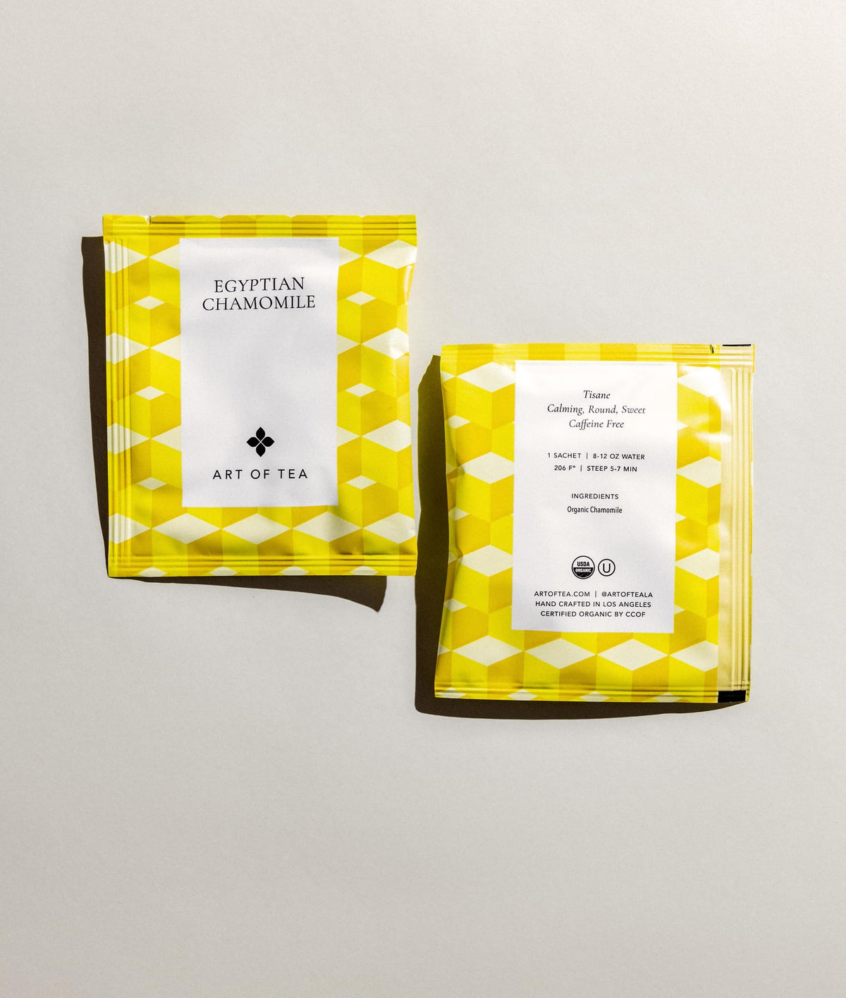 Art of Tea chamomile dried flowers close-up, showcasing floral notes for a soothing evening.