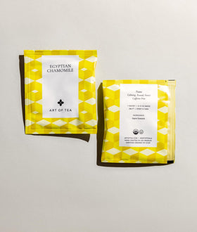 Art of Tea chamomile dried flowers close-up, showcasing floral notes for a soothing evening.