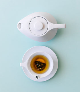 Art of Tea coconut crème blend in a cozy kitchen scene.