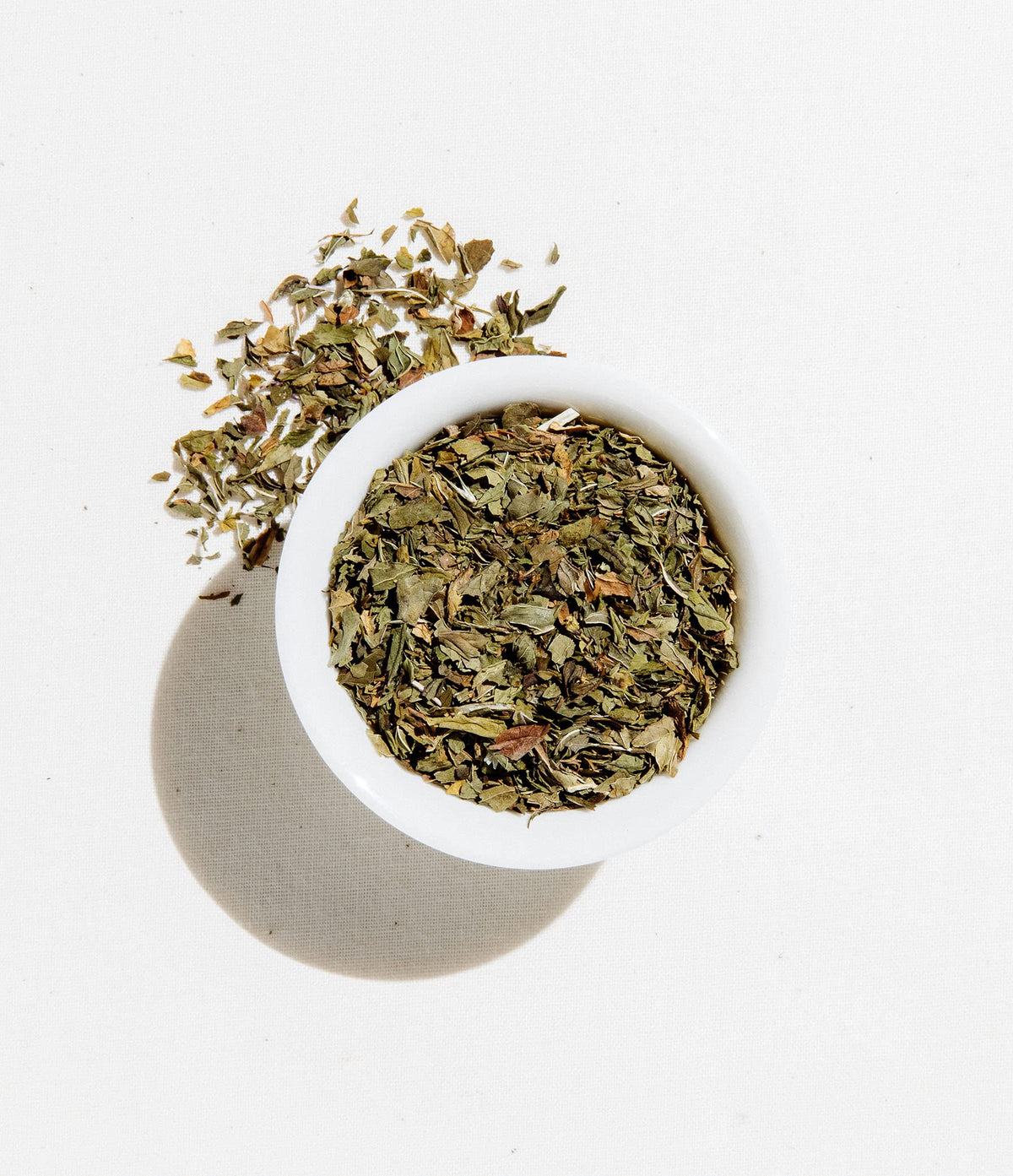 Brewing Art of Tea Pacific Coast Mint in a cup with steam