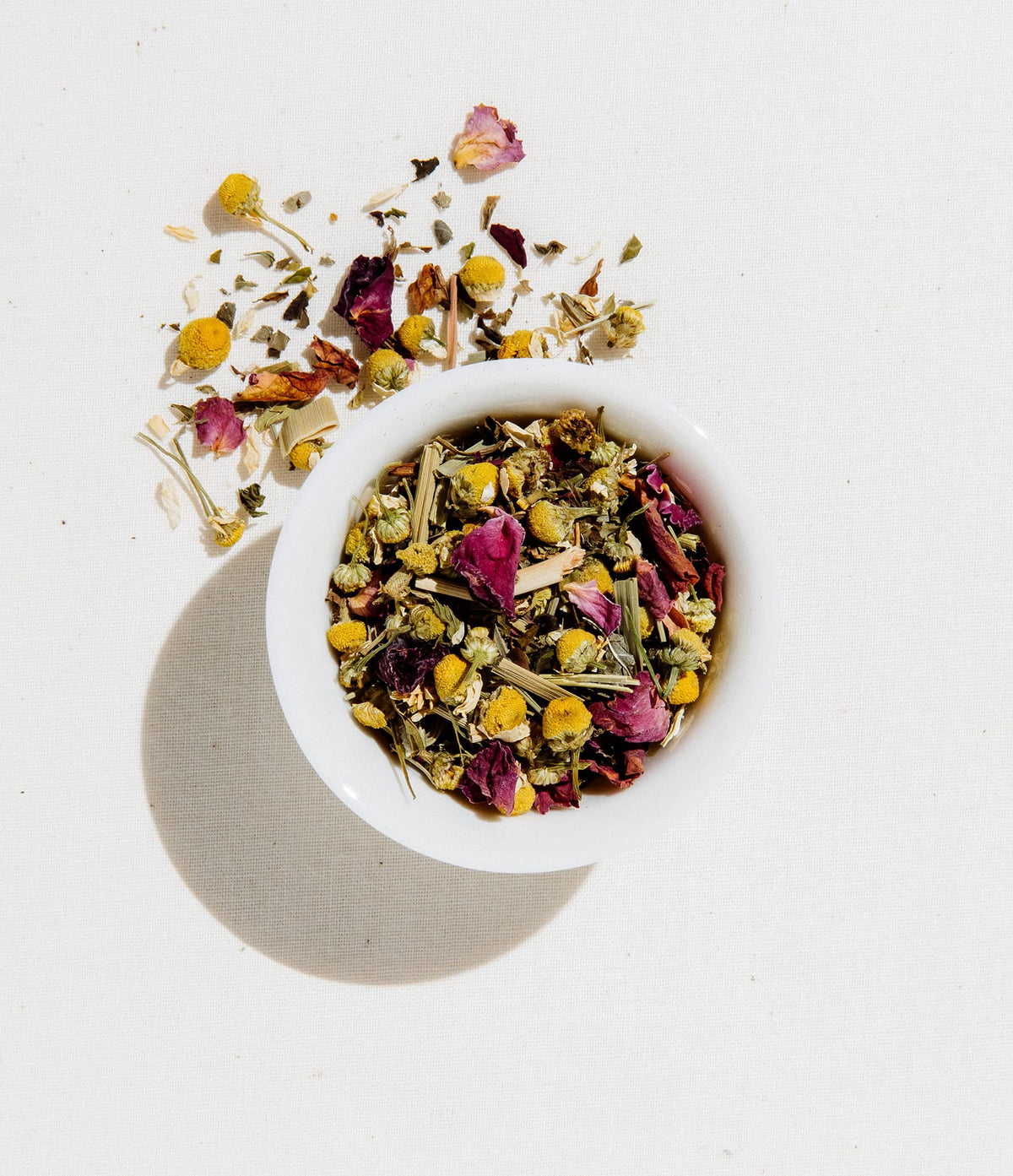Art of Tea Sleep Tea leaf close-up showing chamomile and mint notes.