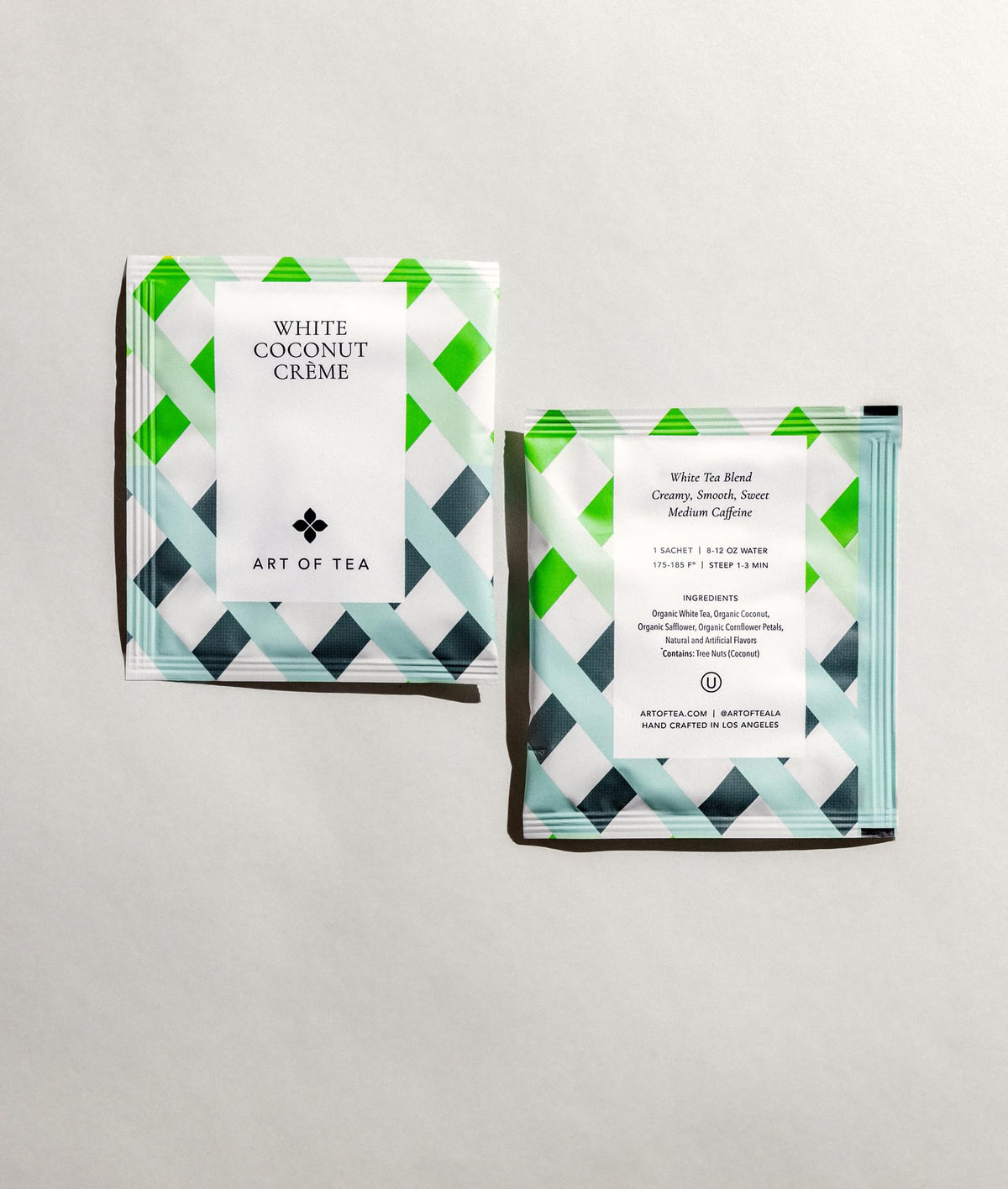 Close-up of Art of Tea White Coconut Crème sachet showing coconut notes