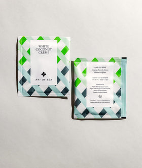 Close-up of Art of Tea White Coconut Crème sachet showing coconut notes