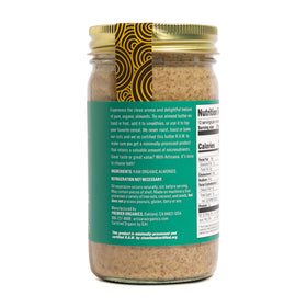 Artisana Almond Butter being poured with a smooth stream ideal for smoothies.