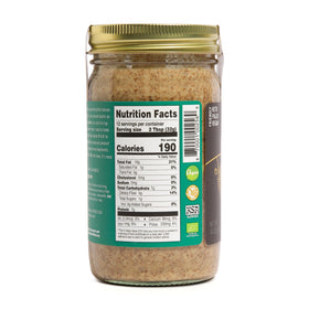 Artisana Almond Butter spread on bread highlighting creamy layer for snacking.