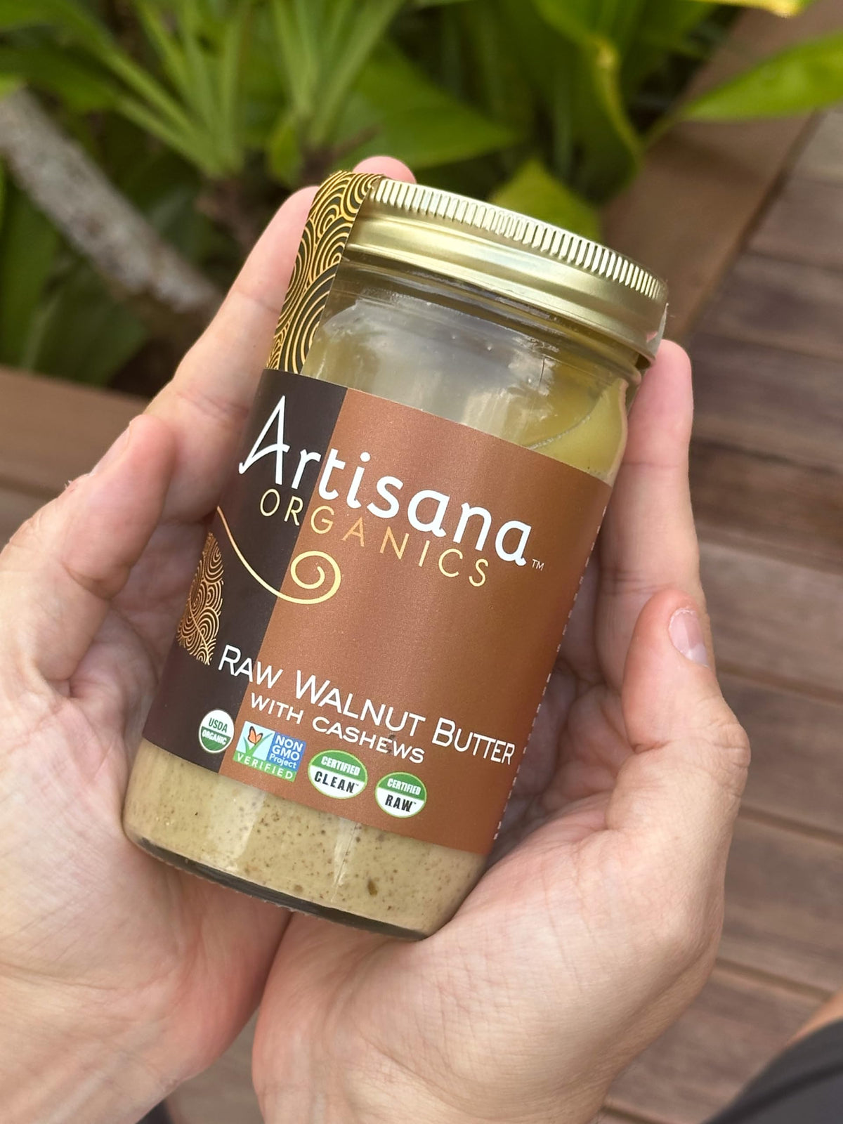 Artisana Organics label close-up highlighting RAW certification and natural quality