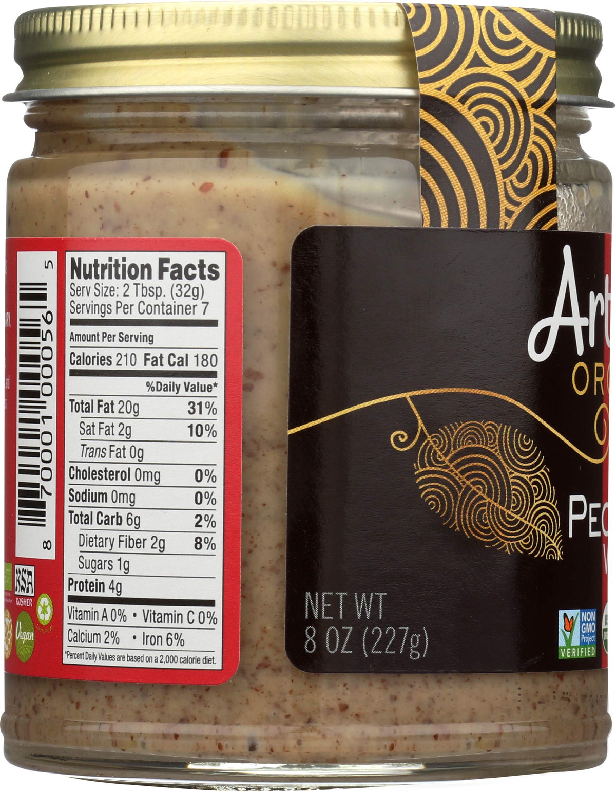 Artisana organic pecan butter jar on a kitchen counter