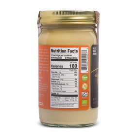 Artisana cashew butter texture appears smooth and ready to enjoy.