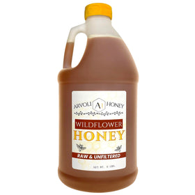 Arvoli bulk honey half-gallon jug for easy bulk use in kitchens and cafes.