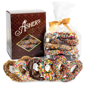 Asher's Chocolates chocolate-covered pretzels gift basket closeup highlighting melt-in-your-mouth sweetness.
