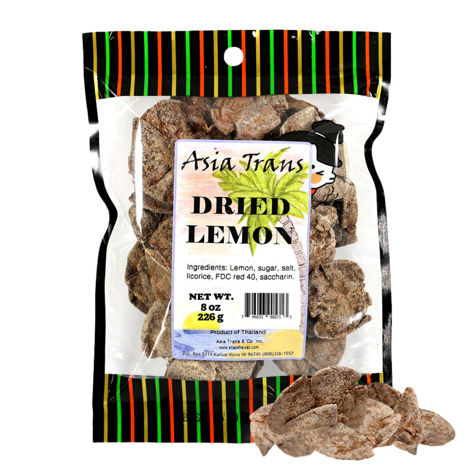 Asia Trans & Co. dried lemon slices on a wooden plate, bright and tangy snack