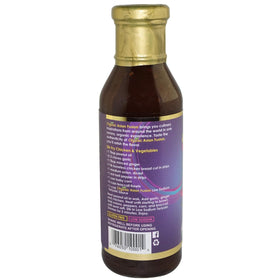 Asian Fusion Teriyaki sauce bottle marinating chicken with savory aromas.