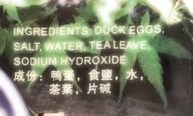 Asian Taste Preserved Duck Eggs served over congee, showcasing versatile traditional use