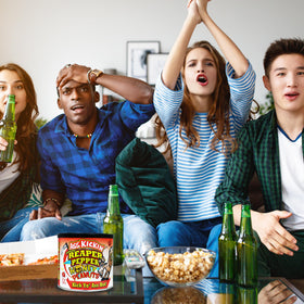 ASS KICKIN' Carolina Reaper peanuts platter — sharing a fiery treat.