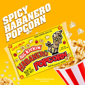 ASS KICKIN' Habanero popcorn on a table set for a movie night.