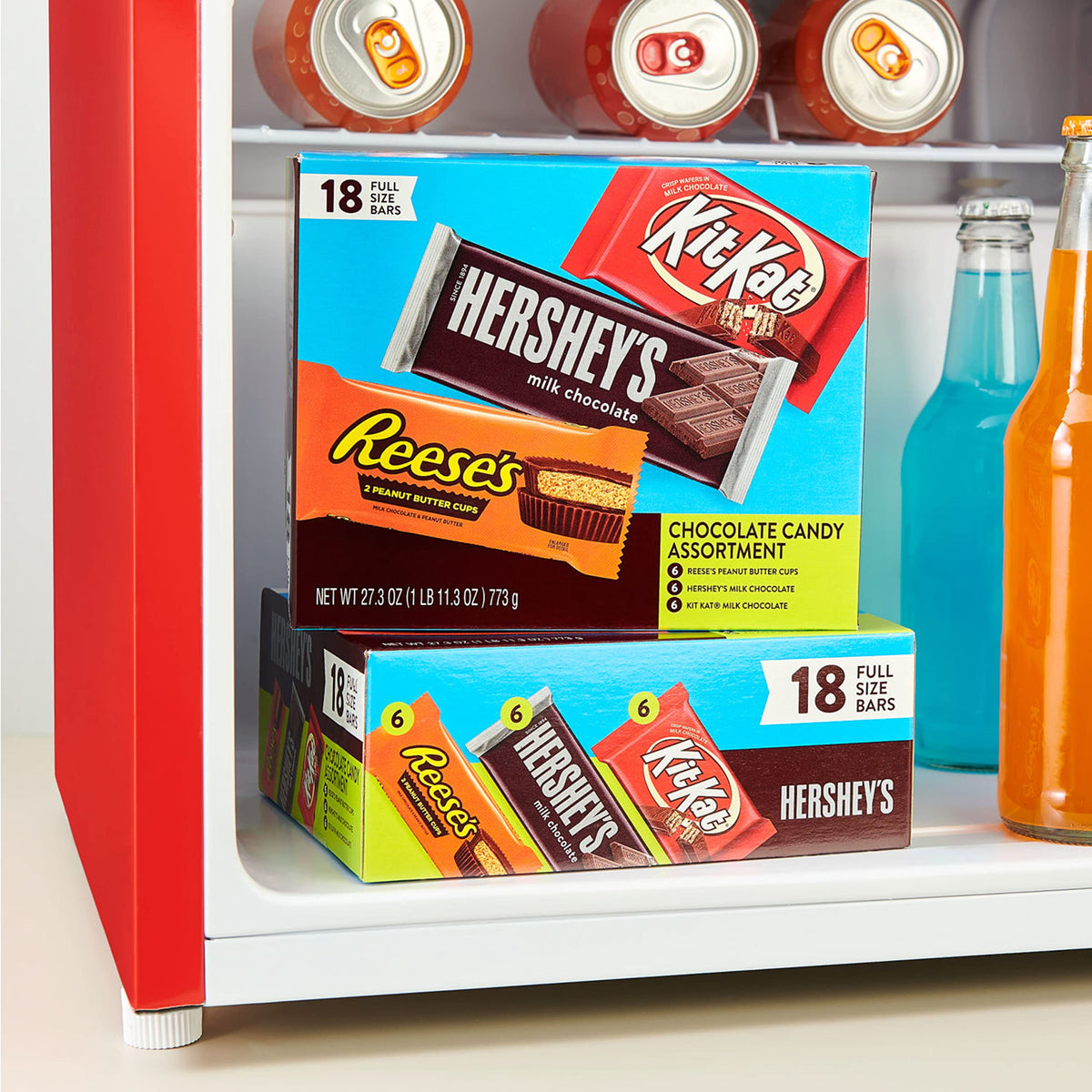 Assorted chocolate packaging on store shelf suitable for concessions