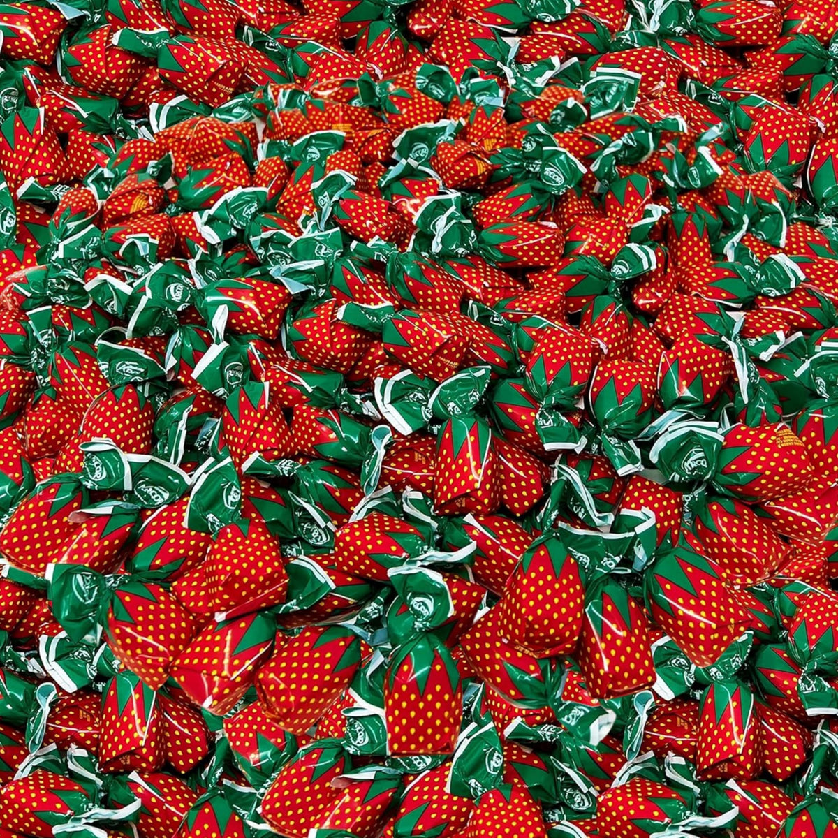 Assortit bulk strawberry hard candy with real pulp—fruity, shareable treat