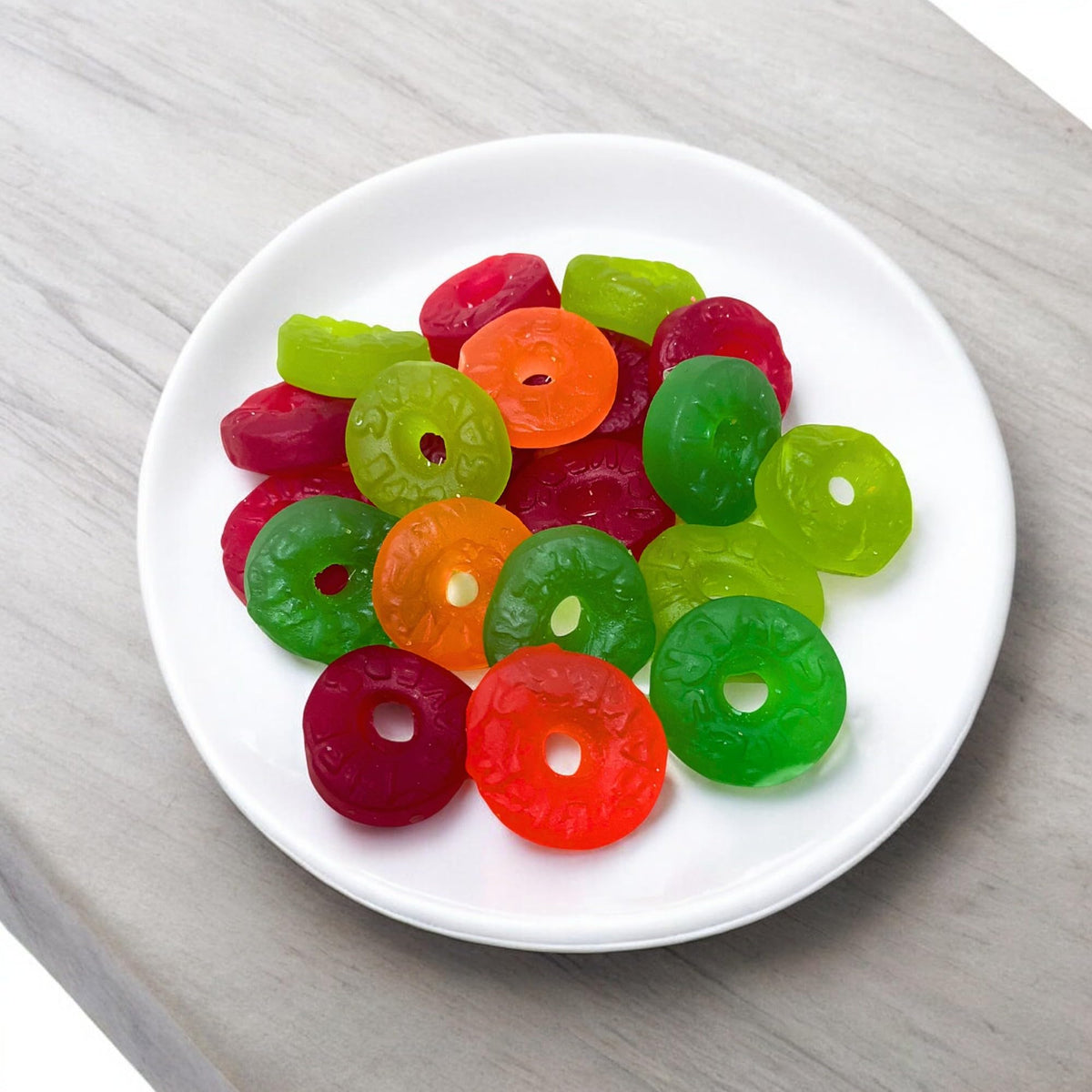 Assortit Christmas stockings gummies add colorful festive treats.