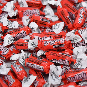 Party table display with Assortit Fruit Punch Frooties as favors