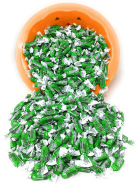 Assortit Green Apple Frooties displayed on a snack table at an event