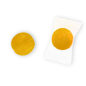 Closeup of Assortit Peach Buttons reveals juicy peach flavor and classic candy texture.