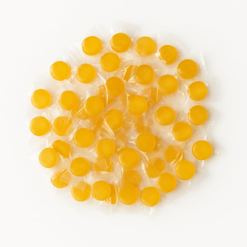 Assortit Peach Buttons in a serving bowl makes a festive candy centerpiece.