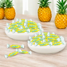 Assortit Pineapple Tootsie Roll Frooties tropical flavor visible in each piece.