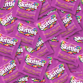 Assortit Skittles Wild Berry candy bag showing colorful pieces for snacking.