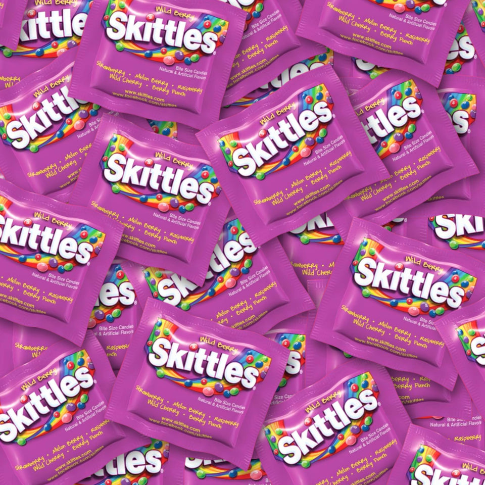 Assortit Skittles Wild Berry candy bag showing colorful pieces for snacking.