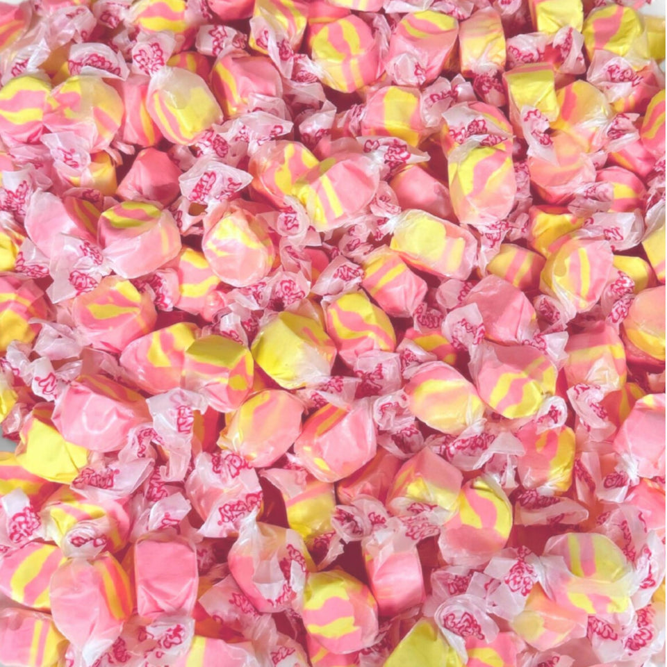 Assortit strawberry banana taffy 1lb bag; ideal for sharing at parties.