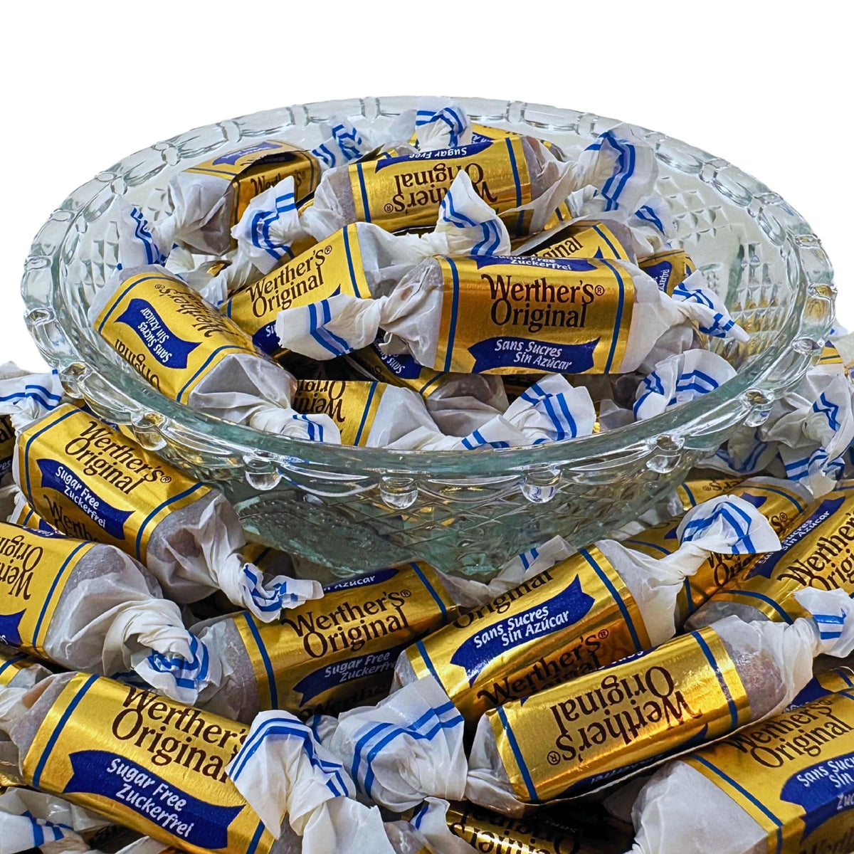 Assortit Werther's Original sugar-free caramels displayed on desk for office treats