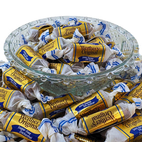 Assortit Werther's Original sugar-free caramels displayed on desk for office treats