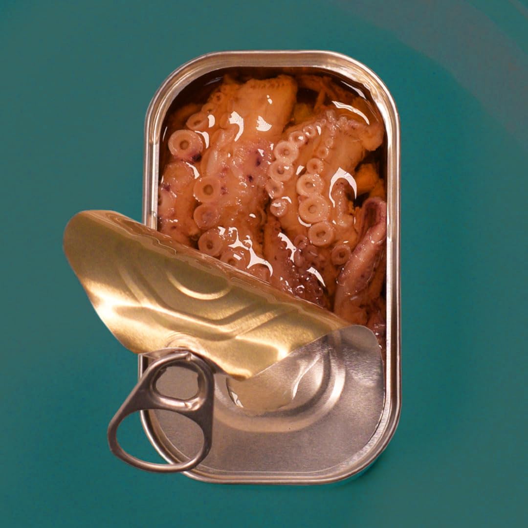 Ati Manel wild caught octopus in garlic sauce can for flavorful meals.