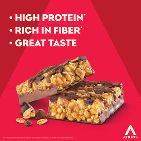 Close-up of Atkins Granola Bar showing chocolate chips and crunchy granola texture.